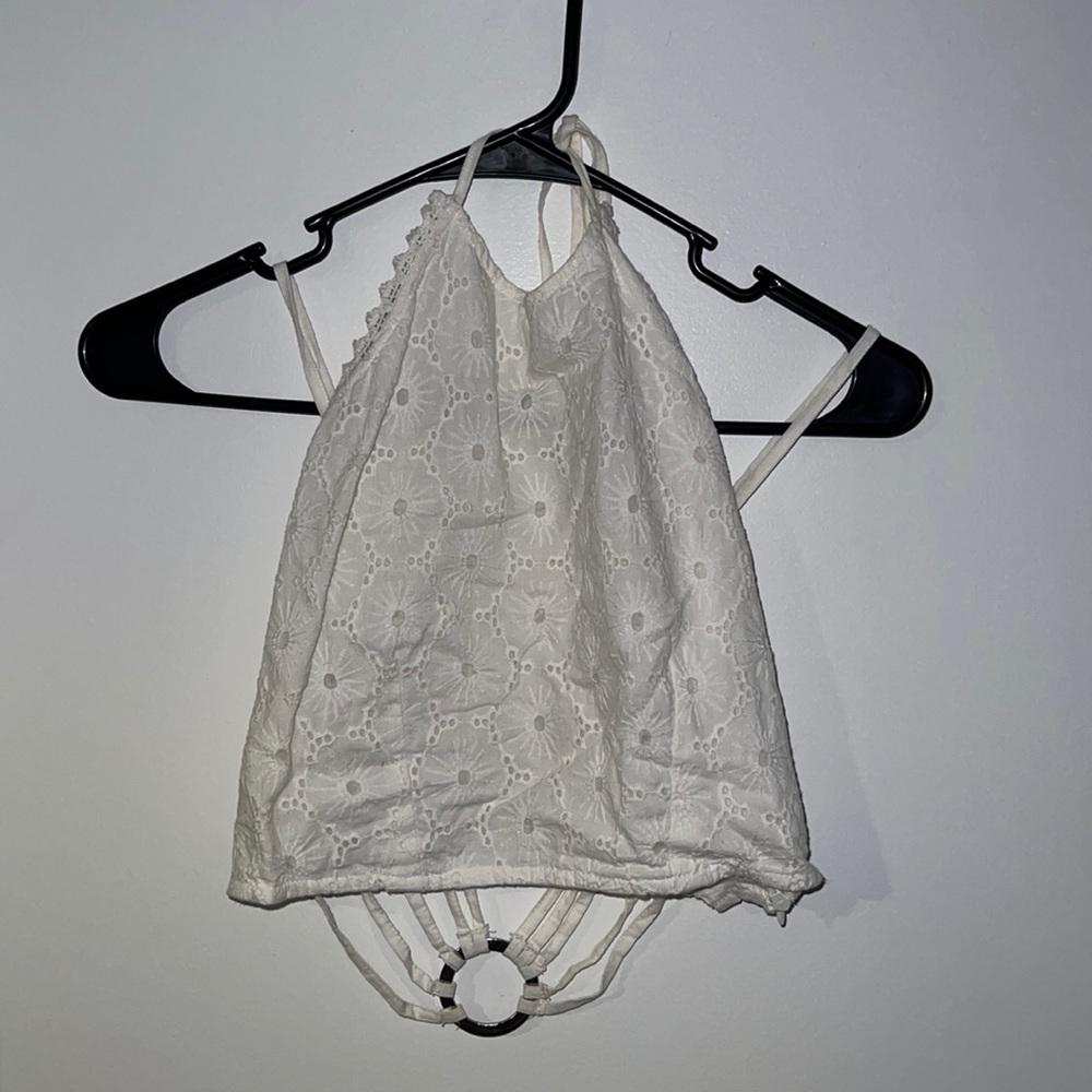 High neck open back crop in white. US size small